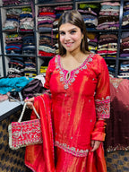 Lakshita- Shimmer silk handwork with clutch suit