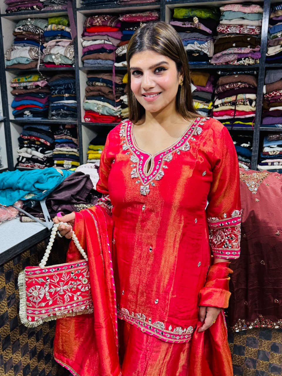 Lakshita- Shimmer silk handwork with clutch suit