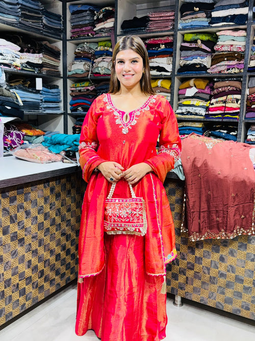 Lakshita- Shimmer silk handwork with clutch suit